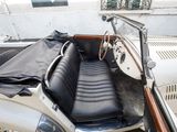 a car that is sitting in the back of a truck