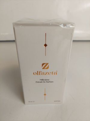 une photo d'une boîte d'Olfazeta posée sur une table