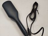 an image of a hair dryer on a table