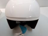 a white helmet with a blue tag attached to it