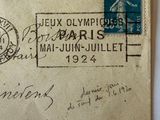 an old envelope with a picture of a man holding a tennis racquet on top of it