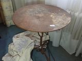 a small table with a cloth on it in a room