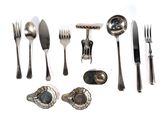 many different types of silverware on a white surface
