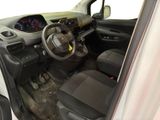 a picture of the interior of a car with a steering wheel