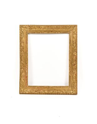 an old picture frame with a gold leaf pattern on a white background