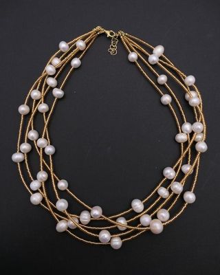 Collier multi-rangs orné de perles de culture. - Photo 1