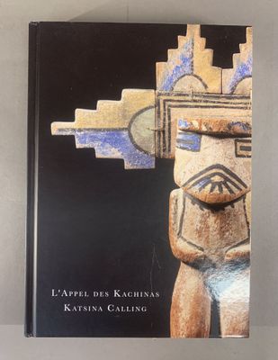 the cover of a book with an image of a wooden figure on it