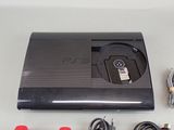 an image of a video game console and accessories
