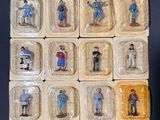 many small plastic figurines of people in different colors
