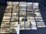 several old postcards of different types and sizes on a table