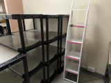 a ladder leaning up against a wall in a room