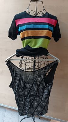 a mannequin with a multicolored shirt on it