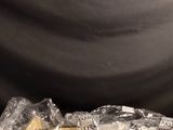 a person standing in front of a table with food on it