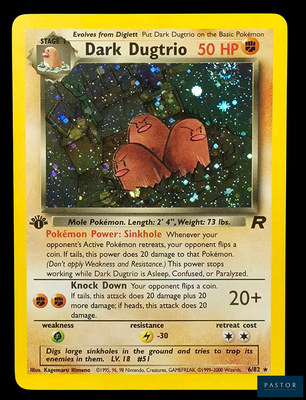 une carte Pokémon sur laquelle figurent deux Pokémon rouges