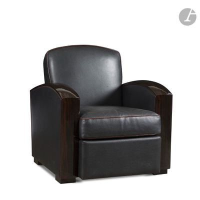 the chair is made of black leather and has a wooden frame
