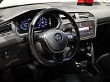 the interior of a car with a steering wheel, dashboard, and dashboard lights