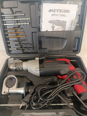 an image of a box with tools in it on a table