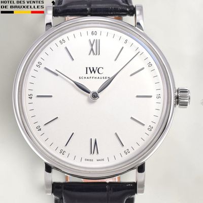 an image of a close up of a wrist watch with roman numerals