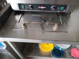 an image of a commercial fryer in a commercial kitchen