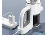 an image of a coffee maker with a power strip
