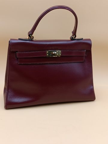 VIMAS. Sac en cuir bordeaux de style Kelly (petite trace d’usure 