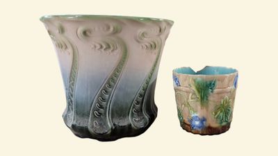 two vases sitting next to each other on a table
