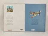 an open book with a picture of a man riding a horse next to a plane