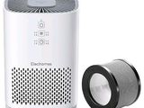 une photo d'un purificateur d'air blanc à côté d'un purificateur d'air noir et blanc
