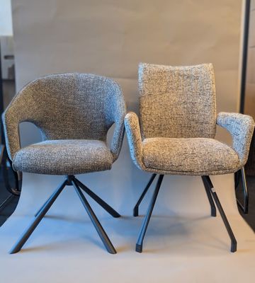 pair of mid - century style chairs with black metal legs and upholstered upholstered upholstered upholstered upholstered upholstered uphol