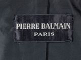 a close up of a label on a black jacket