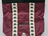 sac fourre-tout violet et noir avec un motif blanc et noir