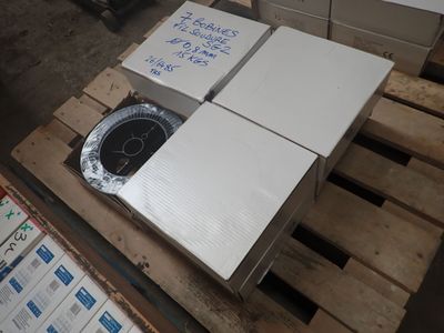 two boxes on a pallet that are stacked on top of each other