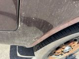 a close up of a car tire with a flat tire