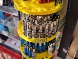 a stack of batteries sitting on top of a table