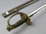 a sword that is laying on a table