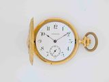an image of a gold pocket watch with a key on a white background