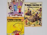 trois livres posés ensemble sur la table