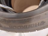 a close up of a tire on a white surface