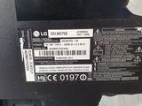 a close up of the back of a printer with a label on it
