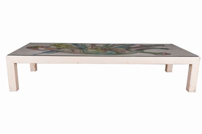 an image of a coffee table with a glass top