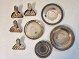 a lot of silver objects that are on the table
