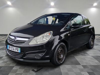 a picture of a small black car parked in a garage