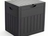 une image représentant une boîte de rangement en plastique noir sur fond blanc
