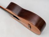 an image of a guitar with a wooden case on a white surface