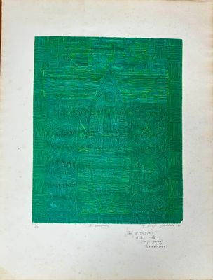 an old book with a green square on it sitting on top of a table