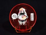 a watch that is sitting in a red case