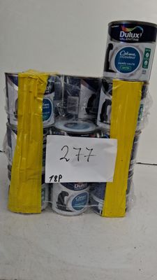 un pot de peinture à côté d'un pot de peinture et d'un pot de peinture