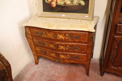 a picture of a painting on a dresser in a room