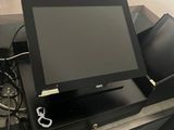 a laptop computer sitting on top of a desk