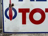 a sign with a red and blue design on it